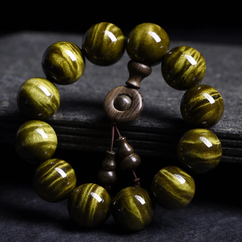 

Natural Phoebe Zhennan Wood Bracelet with Water Wave Dragon Gall Patterns Unisex Prayer Beads Gifts