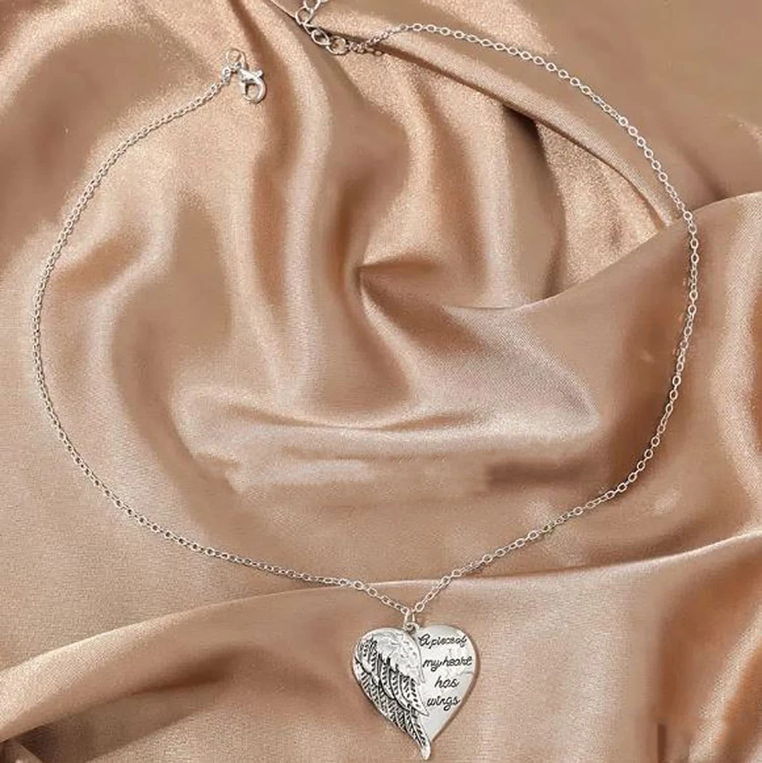 2024 A Piece of My Heart Has Wings Pendant European American Angel Wings Engraved Necklace Jewelry Necklace for Women