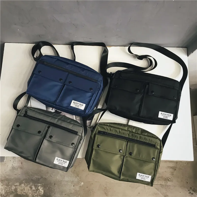 กระเป๋าแฟชั่นผู้ชาย Crossbody กระเป๋ากีฬาสำหรับเด็กชายกระเป๋าสะพายไหล่ชาย Hip-Hop กระเป๋าเป้ลำลองสะพายหลังขนาดเล็กกระเป๋าหิ้วกระเป๋าคู่รัก