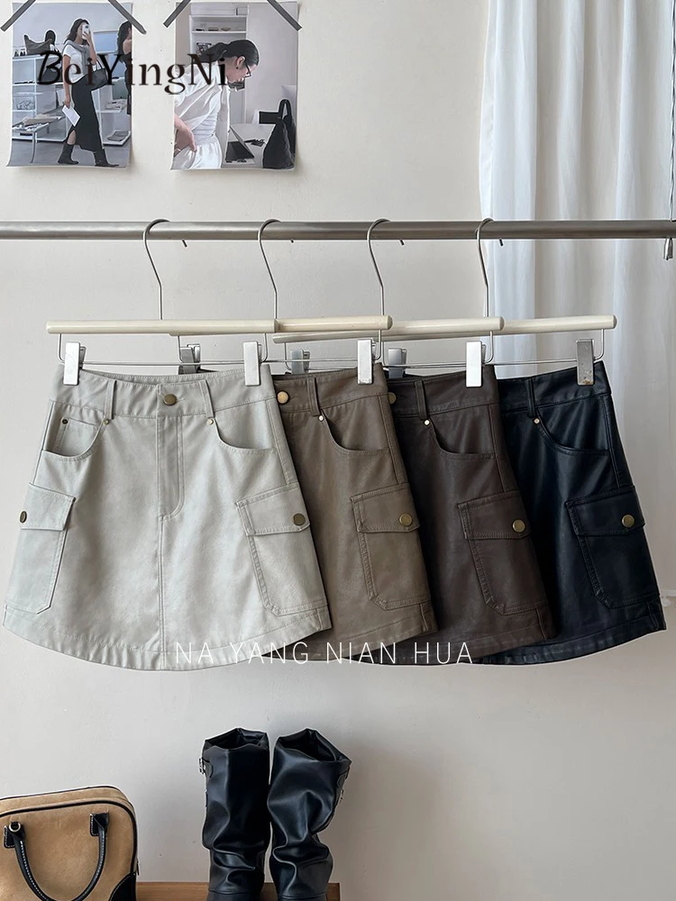 Beiyingni Amerikanischen Stil PU Leder Mini Rock Frauen Vintage Harajuku Hohe Taille A-line Cargo Röcke Damen Casual Straße Faldas