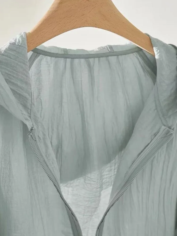 Luźna, swobodna kurtka damska z kapturem, zapinana na zamek, uniwersalna, chroniąca przed słońcem, modny design, wiosna 2025