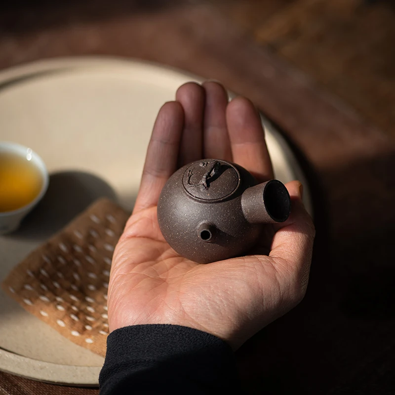 

urgently needed, water injection, tea toy, small capacity, Yixing purple clay pot, purple mud, plum ball incense side handle pot