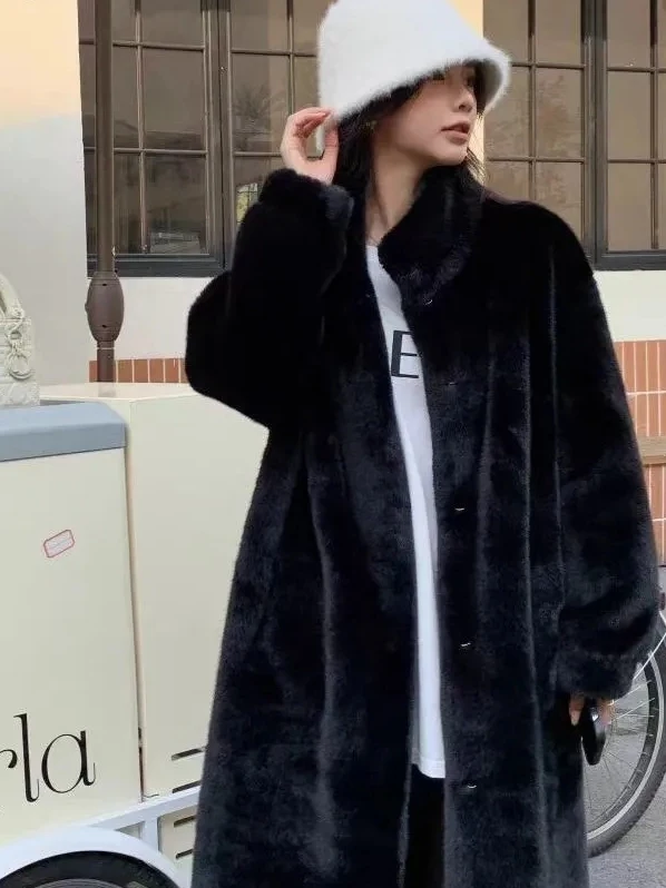 เสื้อโค้ทขนเฟอร์ยาวพิเศษสำหรับผู้หญิง ขนมิงค์ยุโรป ขนเทียมรักษ์โลก ผิวสัมผัสคล้ายน้ำ ทรงหลวม อุ่นสบาย คอตั้ง