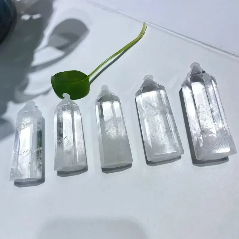 Natural white crystal column ornament crystal rough stone grinding single tip hexagonal energy column degaussing crystal