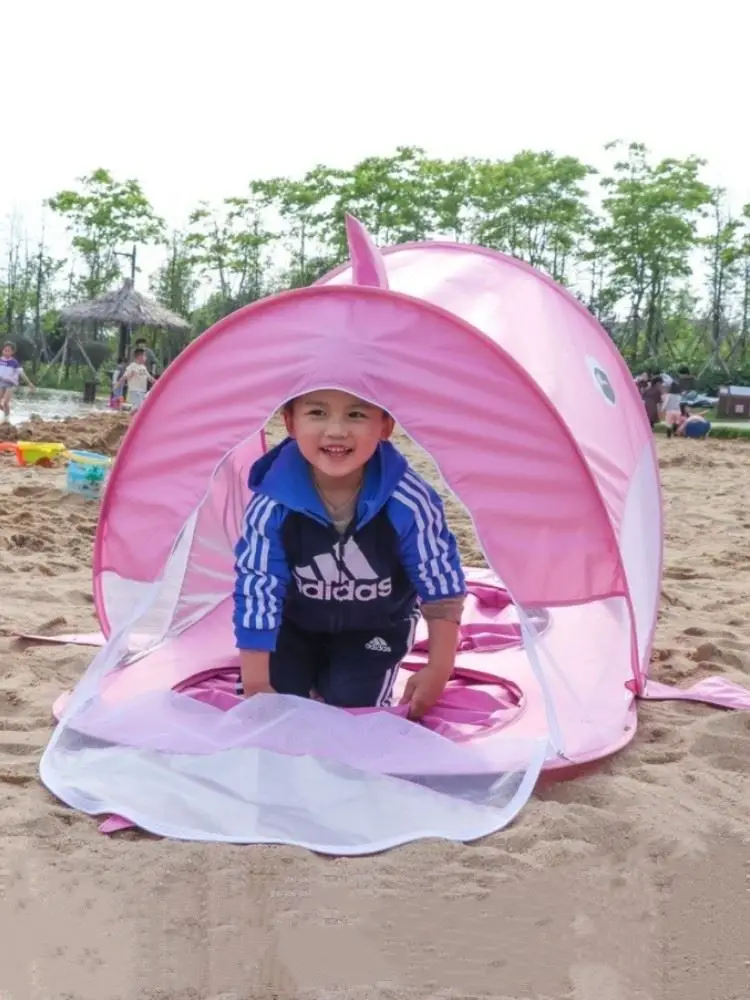 Children's pools, sand digging and water playing tents, sharks and whales, single and double sunshade at the seaside.