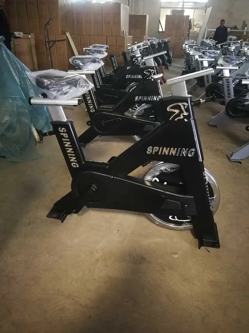 Commercial Gimnasio Static Bicycle Exercise Bikes Fitness Training Chain Spin Bike Flywheel Commercial Spinning Bike