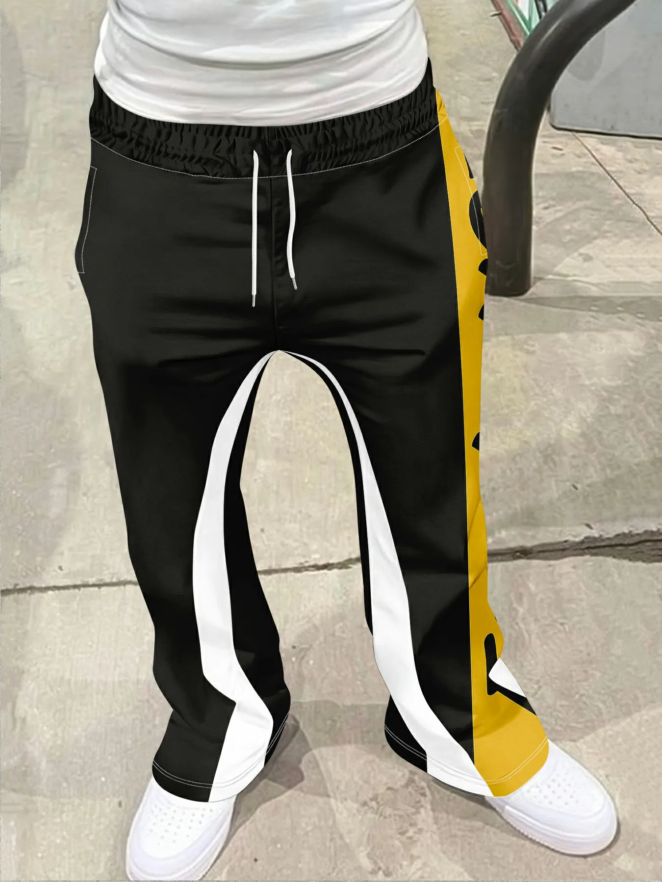 

Мужские повседневные уличные стильные модные модные слегка расклешенные черно-белые спортивные штаны с цветными блоками, мужские брюки