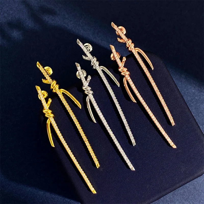 

Copper plated gold jewelry New beautiful tassel studded butterfly earrings in gold and silver, fashionable and elegant