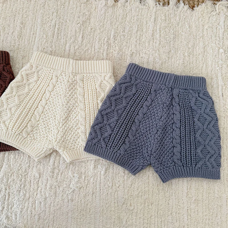 ربيع جديد 2026 ملابس أطفال من عمر 0 إلى 3 سنوات سراويل حياكة للأطفال البنات والأولاد سراويل قصيرة محبوكة على الطراز الكوري للأطفال بلون واحد