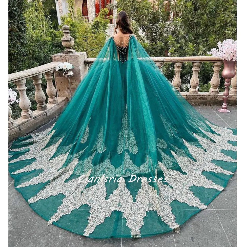 

Emerald Green Illusion Beaded Tassel Quinceanera Dress With Cape Ball Gown Long Sleeve Gold Appliques Corset Vestidos De XV Anos