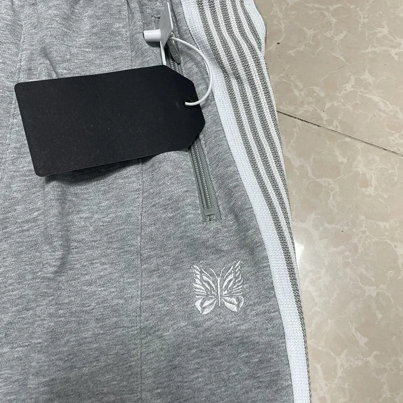 25SS vlinderborduurwerk AWGE wijde pijpen broek heren dames grijs puur katoen oversized gestreepte joggingbroek