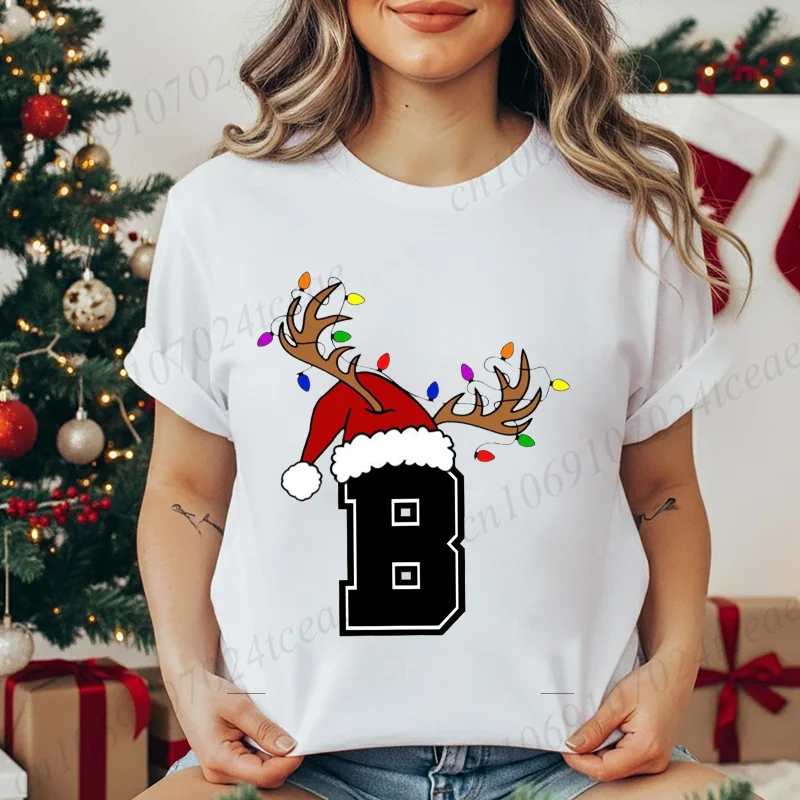 

Женская футболка с рождественским алфавитом, модная футболка с принтом, модный уличный топ с короткими рукавами, шляпа Санты, топ для рождественской вечеринки с оленями