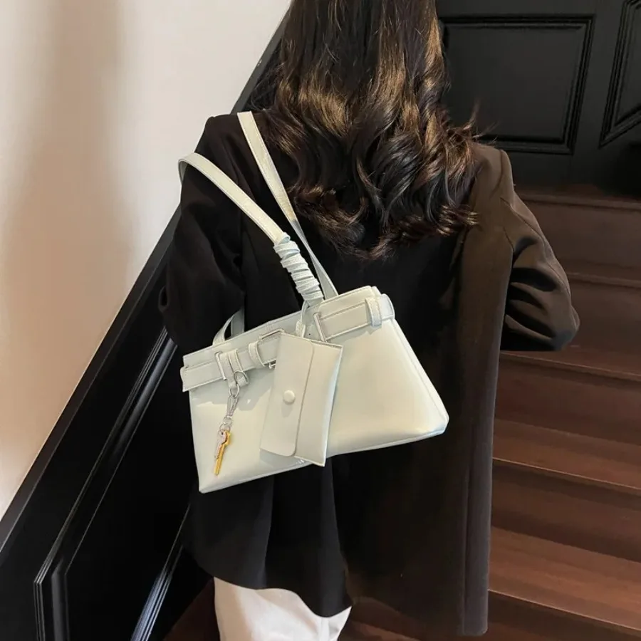 

Fashion retro underarm women's bags large capacity handheld commuting new trend niche temperament biker handsome sub mother bag