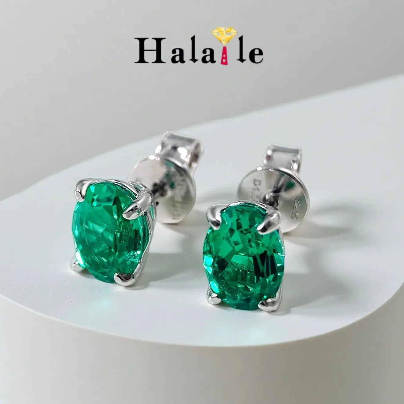 

Женские сверкающие серьги-гвоздики Halaile 1ct 7*9mm овальной огранки с муассанитом и падпарадкой/канарским желтым/самбинским изумрудом/рубином