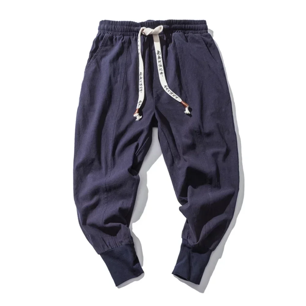 Pantaloni stile harem in cotone e lino da uomo tinta unita elastico in vita streetwear pantaloni 2024 nuovi pantaloni larghi con cavallo basso pantaloni casual da uomo