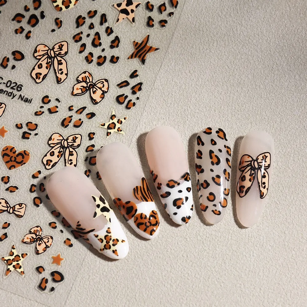3D ヒョウ弓ハートネイルステッカーかわいいヒョウ柄リボンスターネイルアートデカール秋冬 8*10 センチメートルマニキュア装飾