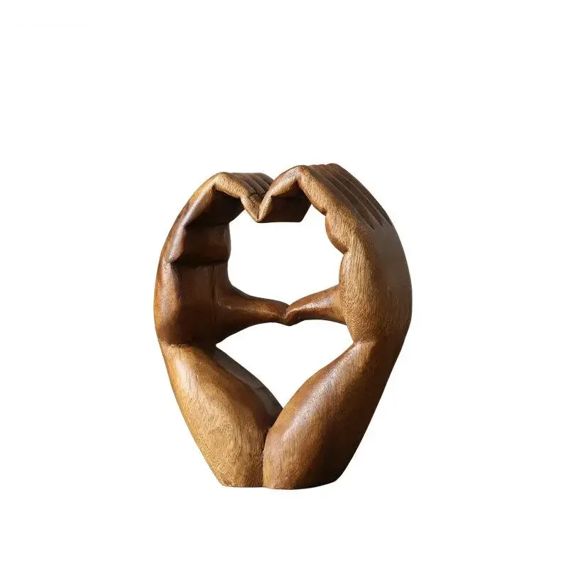 

Ornements sculptés en bois de geste de coeur,