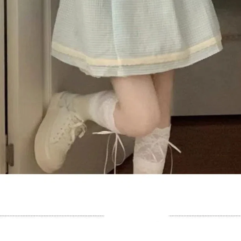 Japanese Sweet Cute Plaid Lolita Summer 2024 New Spliced Doll Neck Button Folds Fashion Solid Color Loose Short Sleeved Dresses