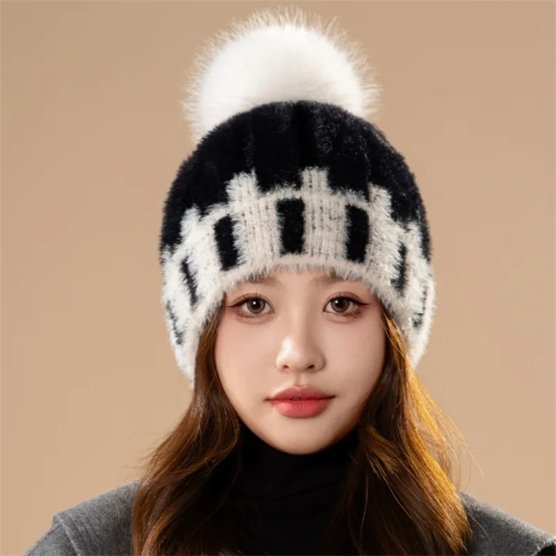 New Korean style knitted hat for women with plush ball. Autumn-winter style, versatile, ear-protecting and warm, trendy.