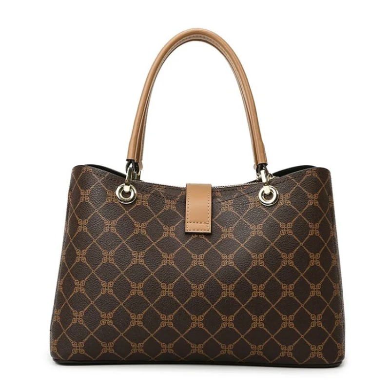 

Элегантная женская сумка через плечо из натуральной кожи с застежкой-молнией сверху и надежной переноской