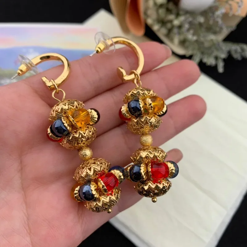 Retro palace style brass gold-plated colored glass earrings three-dimensional circular pendant medieval light luxury style