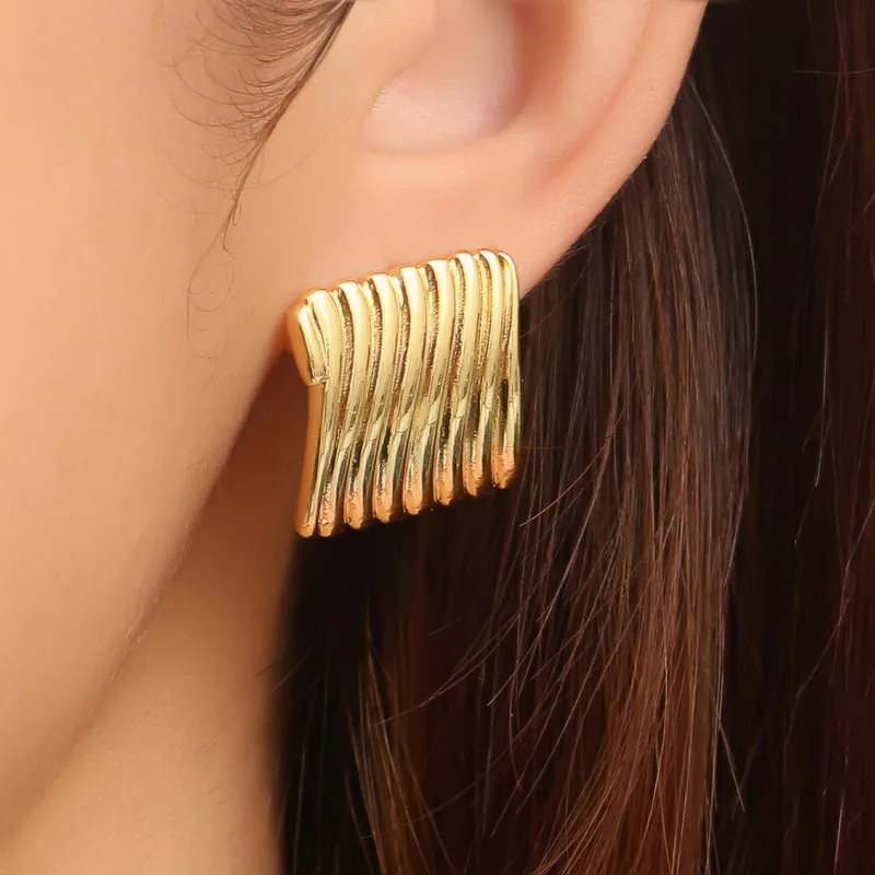 

New Women'S Irregular Wave Pleated Earrings Retro Trend Water Ripple Pattern Glossy Geometric Metal Copper Material Earrings
