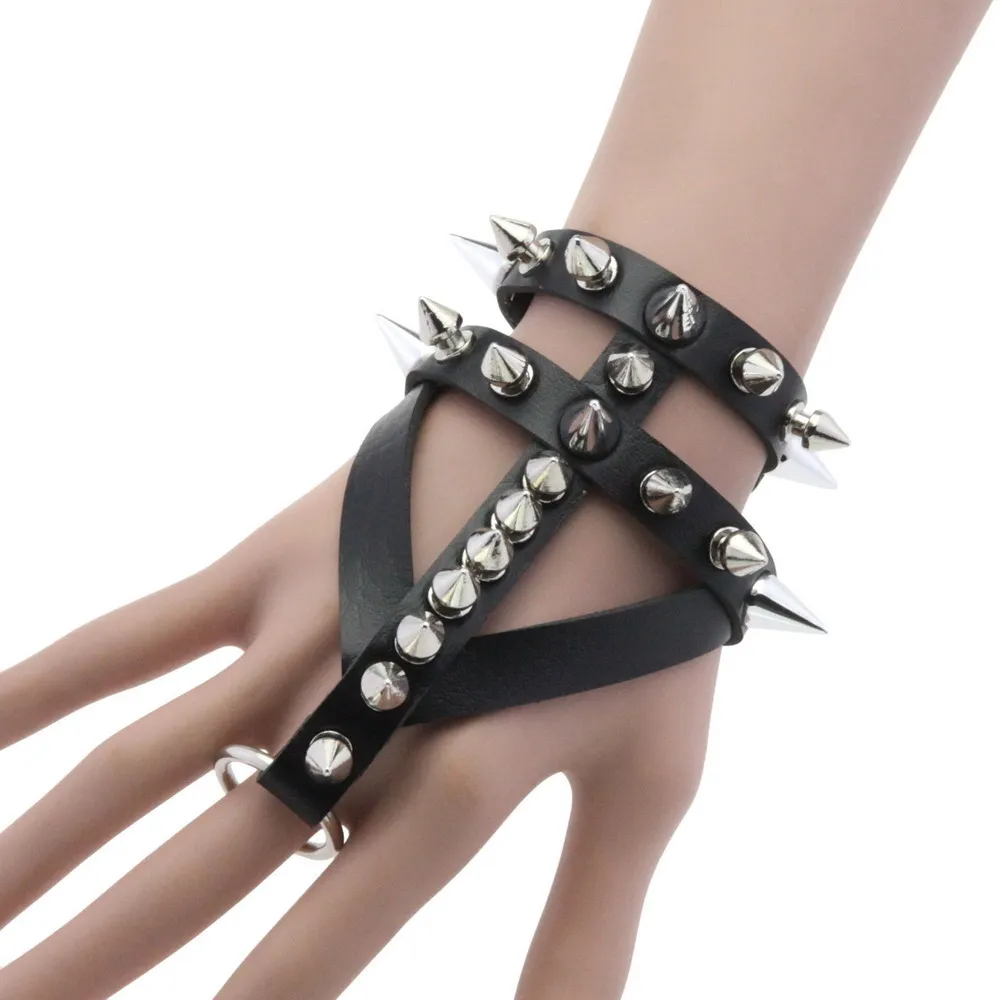 Gothic punk style bracelet with long and short spikes, wristband and ring in one piece