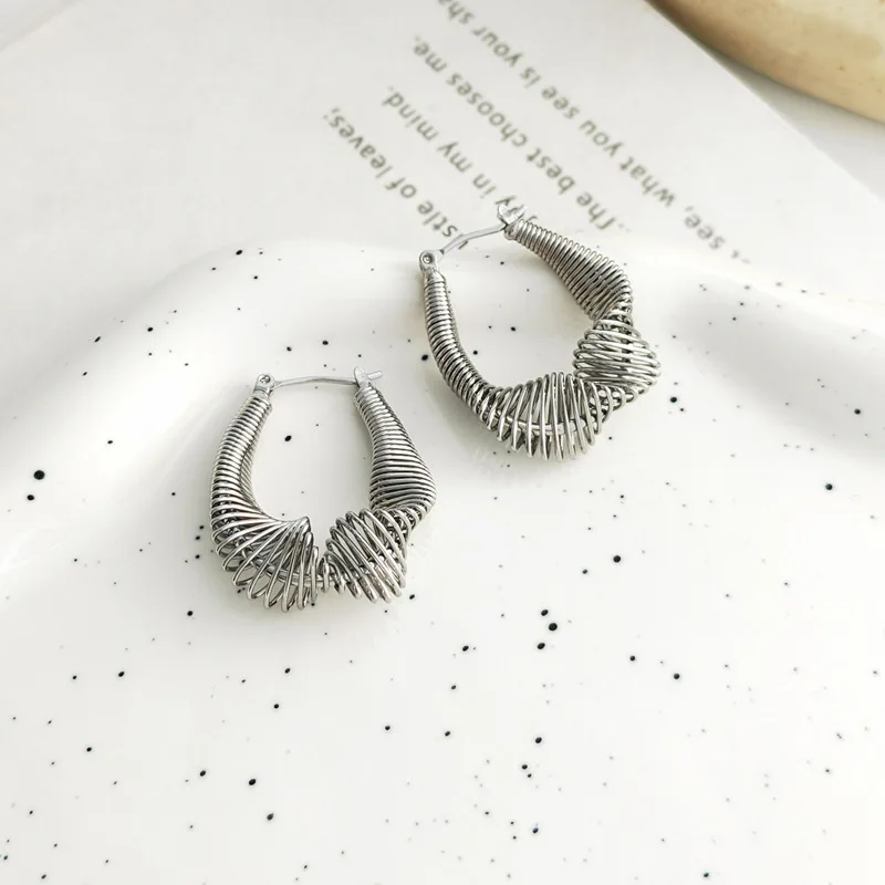 Europe and the United States three-dimensional design spring shape earrings temperament stylish metal ear ring ear ornaments