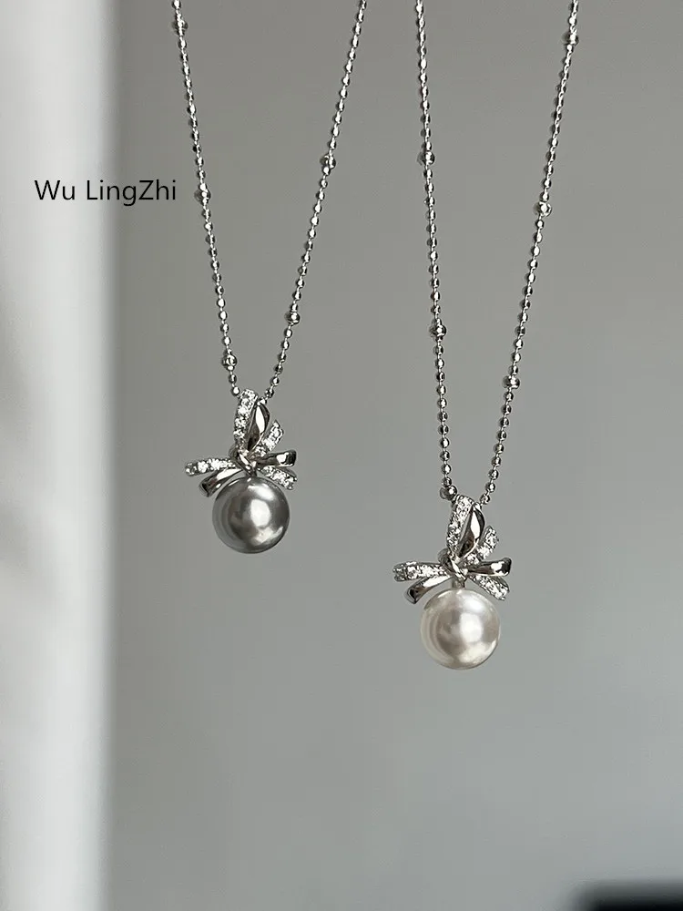 

Wu LingZhi Women 100%925 Silver Necklace Female Girls Neck Chain Bow Austrian Pearls Necklaces Top Quality Choker Chain New