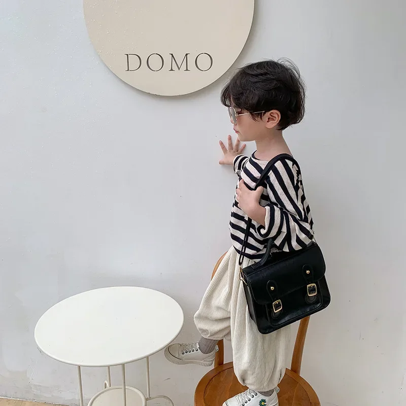 Zaino per bambini nuovo stile semplice coreano retrò ragazzi e ragazze Cute PU Casual School Cool Handsome Street-Photography Sweet Handbag