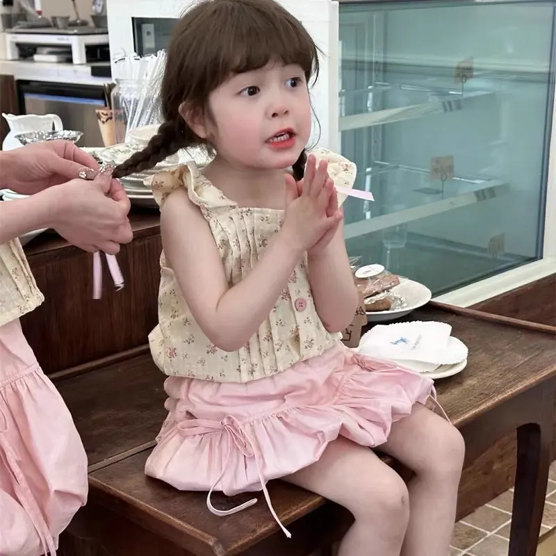 2026 New Toddler Girl Floral Pleated Flutter Sleeve Blouse Bud Shaped Tie Skirt Summer Two Piece Clothes Set