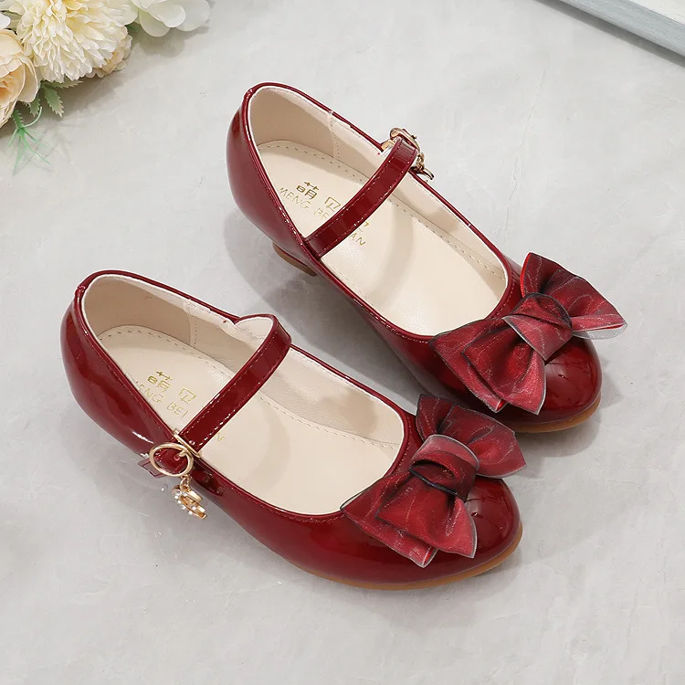 

Girls Fashion High Heeled Leather Shoes Children Princess Shoes Versatile Bows Beanies Single Shoes Buckle Lacquer Performance
