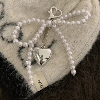 ZAKOL-Llavero de corazón con lazo blanco para mujer, dulce abalorio, lazo de perla, mochila, llavero, joyería hecha a mano, adorno, bolsos, colgantes, Gif