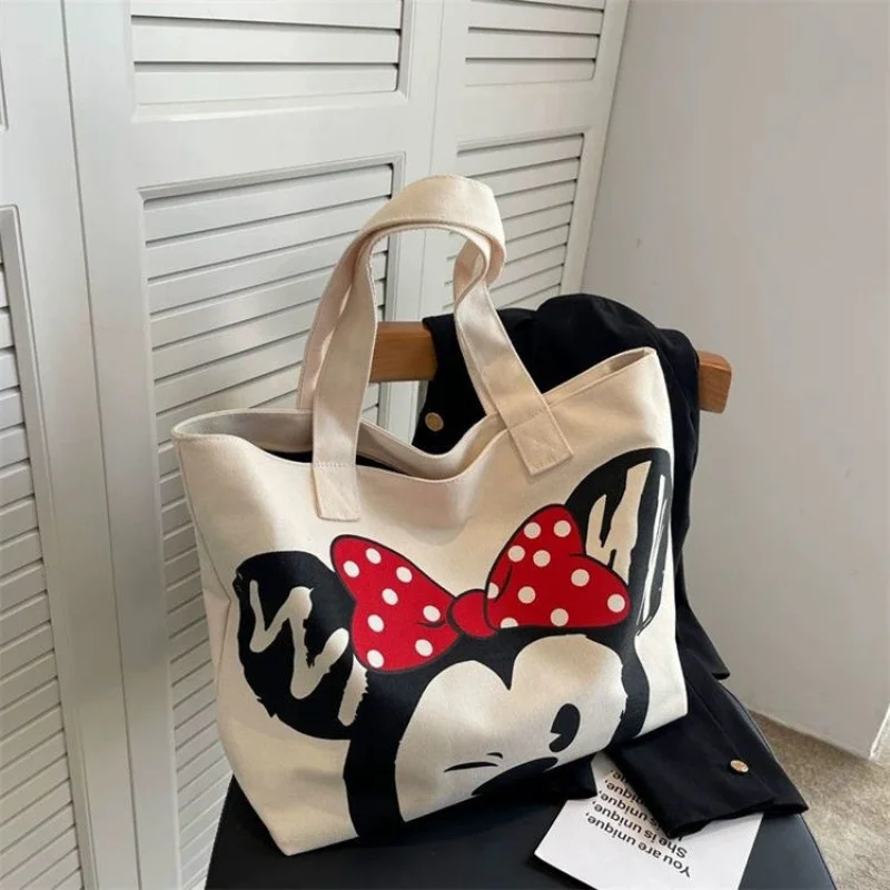 

Disney Mickey's new canvas bag women's shoulder messenger bag cute Minnie class large-capacity handbag