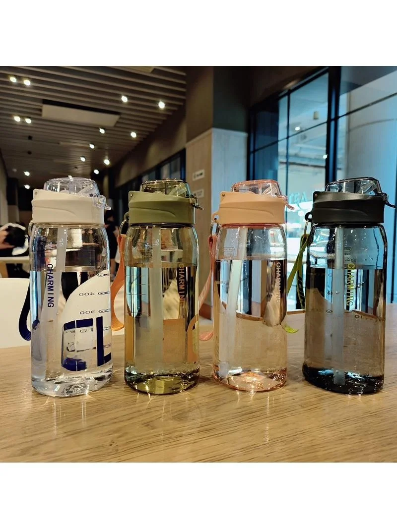 

Large Capacity Plastic Space Cup Sports Water Bottle with Straw And Scale Anti-Fall High Temperature Resistant Student Cup