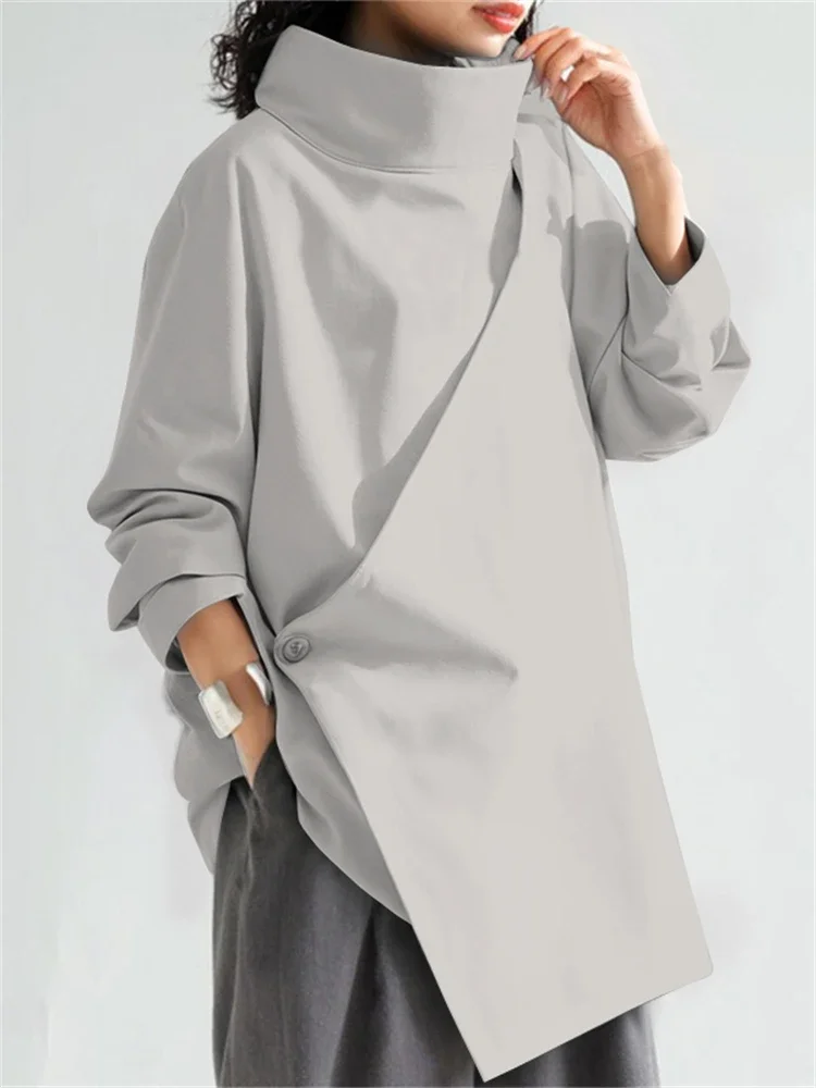 UOOZEE Top asimmetrici a collo alto da donna 2025 Nuova primavera maniche lunghe Moda Nero Colore bianco T-shirt casual allentate quotidiane