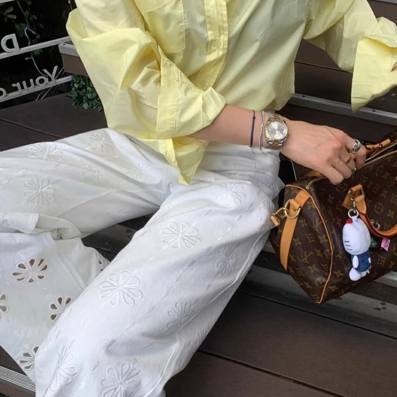 American High Street White Embroidered Openwork Jeans Female Design Sense Heavy Industry Wide Leg Lace Casual Mop Pants.