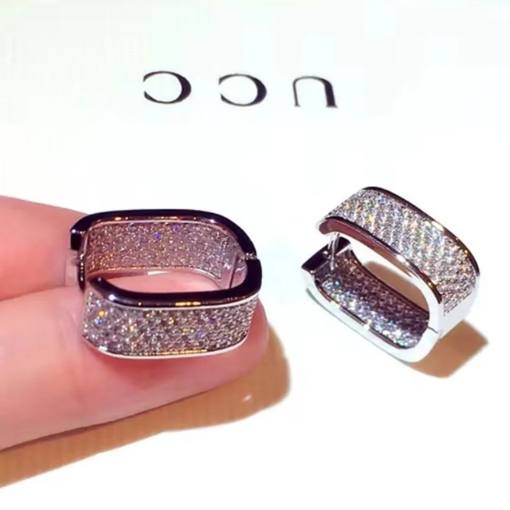 

Sparkling zircon earrings, brass metal anti allergic material, U-shaped metal jewelry, simple and fashionable women's earrings