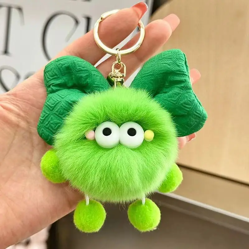 Cute dopamine elf plush keychain with big eyes, bow & bell. Perfect for bags,phones & gifts. Great for family, friends & lovers.