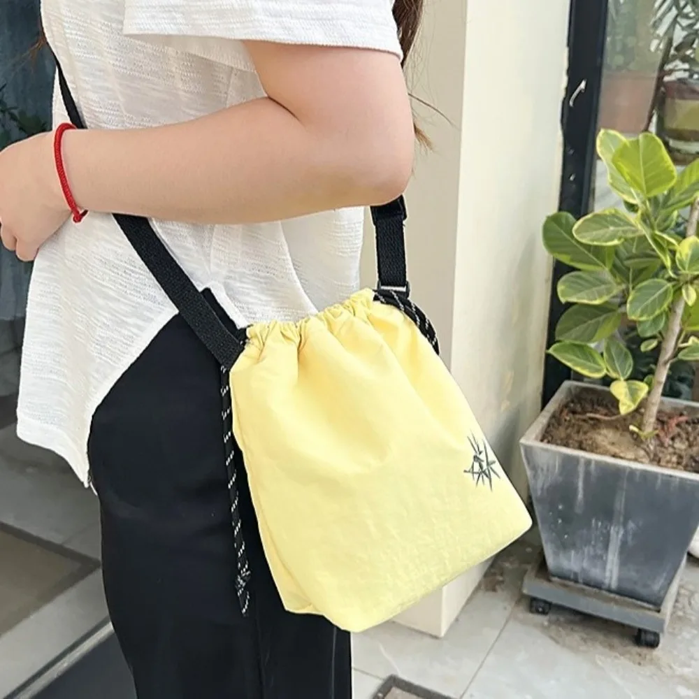 

Adjustable Drawstring Shoulder Bag Large Capacity Lightweight Nylon Bucket Bag Korean Style Storage Bag Crossbody Bag Girl