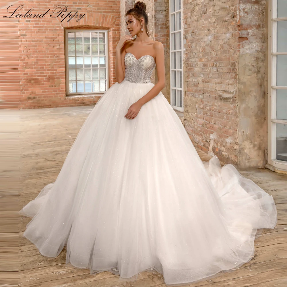 

Lceland Poppy Elegant A Line Princess Strapless Rhinestone Beaded Wedding Dresses Sleeveless Bridal Gowns with Chapel Train