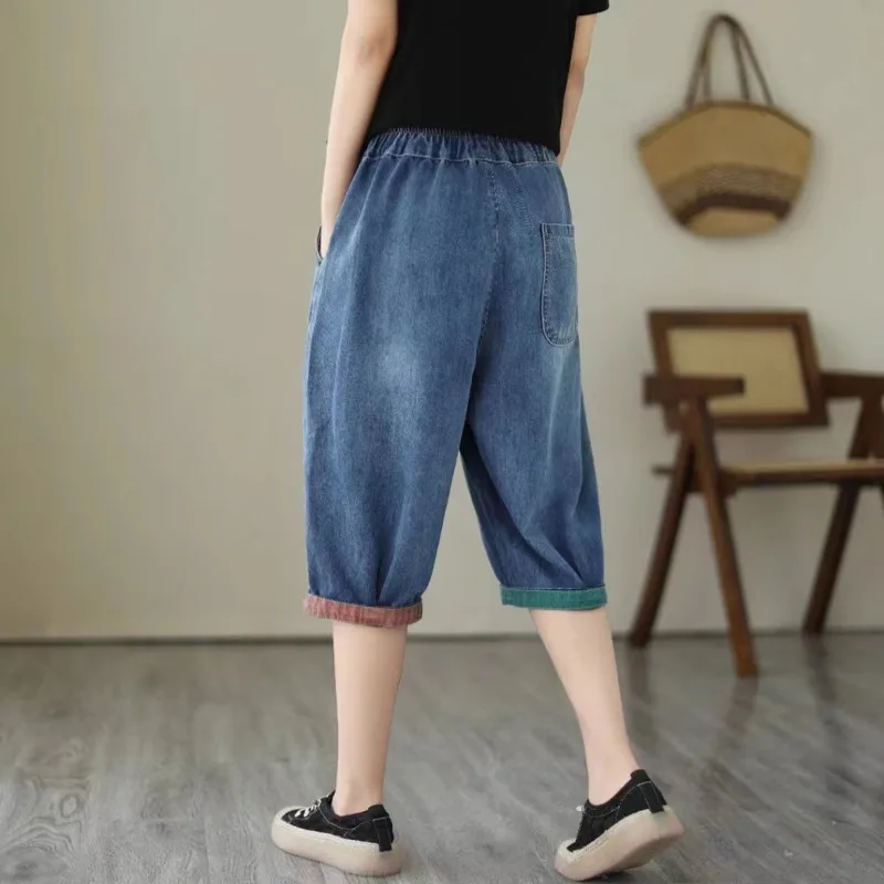 Celana Jeans Enam Titik Wanita Modis Celana Tengah Ukuran Besar Kasual Longgar Tipis Musim Panas Celana Wanita Pinggang Elastis Lubang Waed