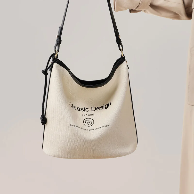 

Fashionable New Women's Cowhide Crossbody Bag with High-end Feel Multifunctional Handbag Casual Canvas Large Capacity Handbag