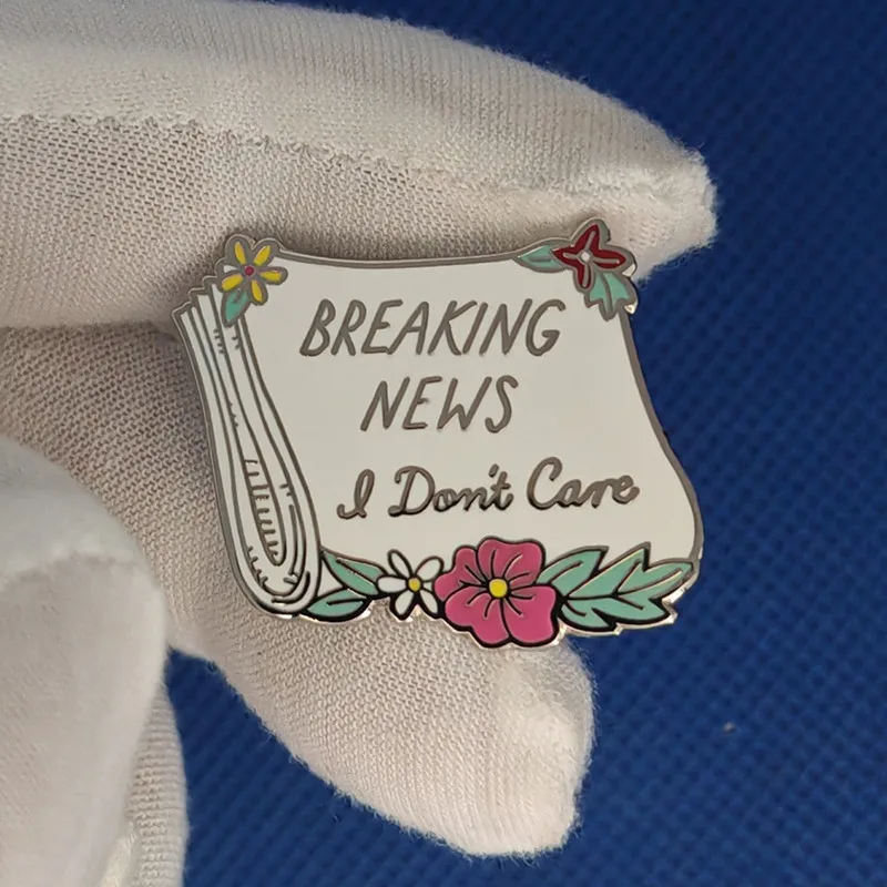 Breaking news, I don't care about newspaper brooches