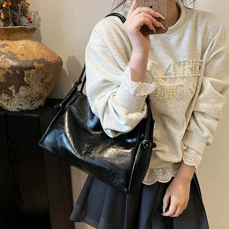 

Luxury Brand Inspired Women Handbag With Signature Pattern For Fashionable Outings And Events
