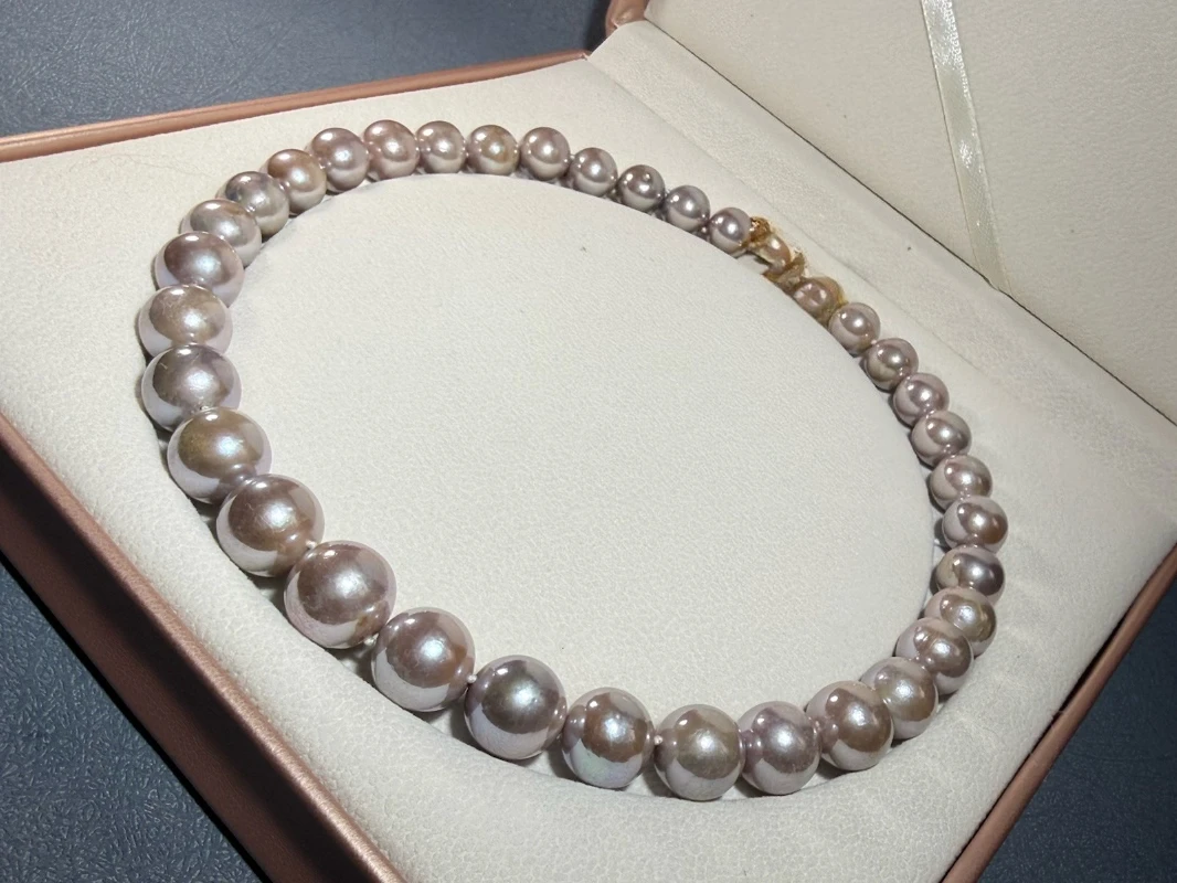 

Огромное натуральное ожерелье из культивированного фиолетового жемчуга 11-14 мм/круглой формы