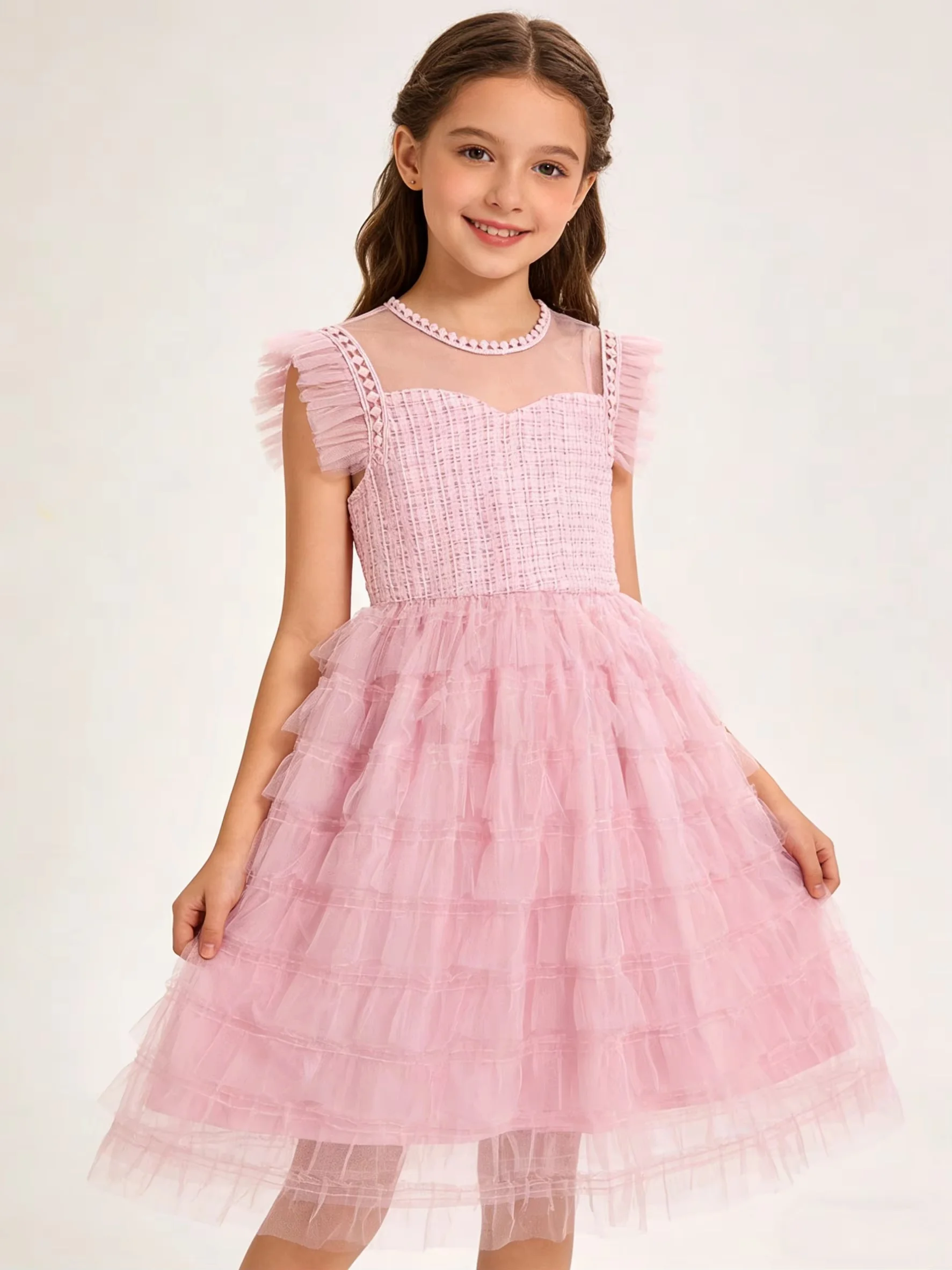 Girls' round neck sleeveless tulle ball gown. Simple bodice matches fluffy skirt, sweet and lively. Custom sizes available for w