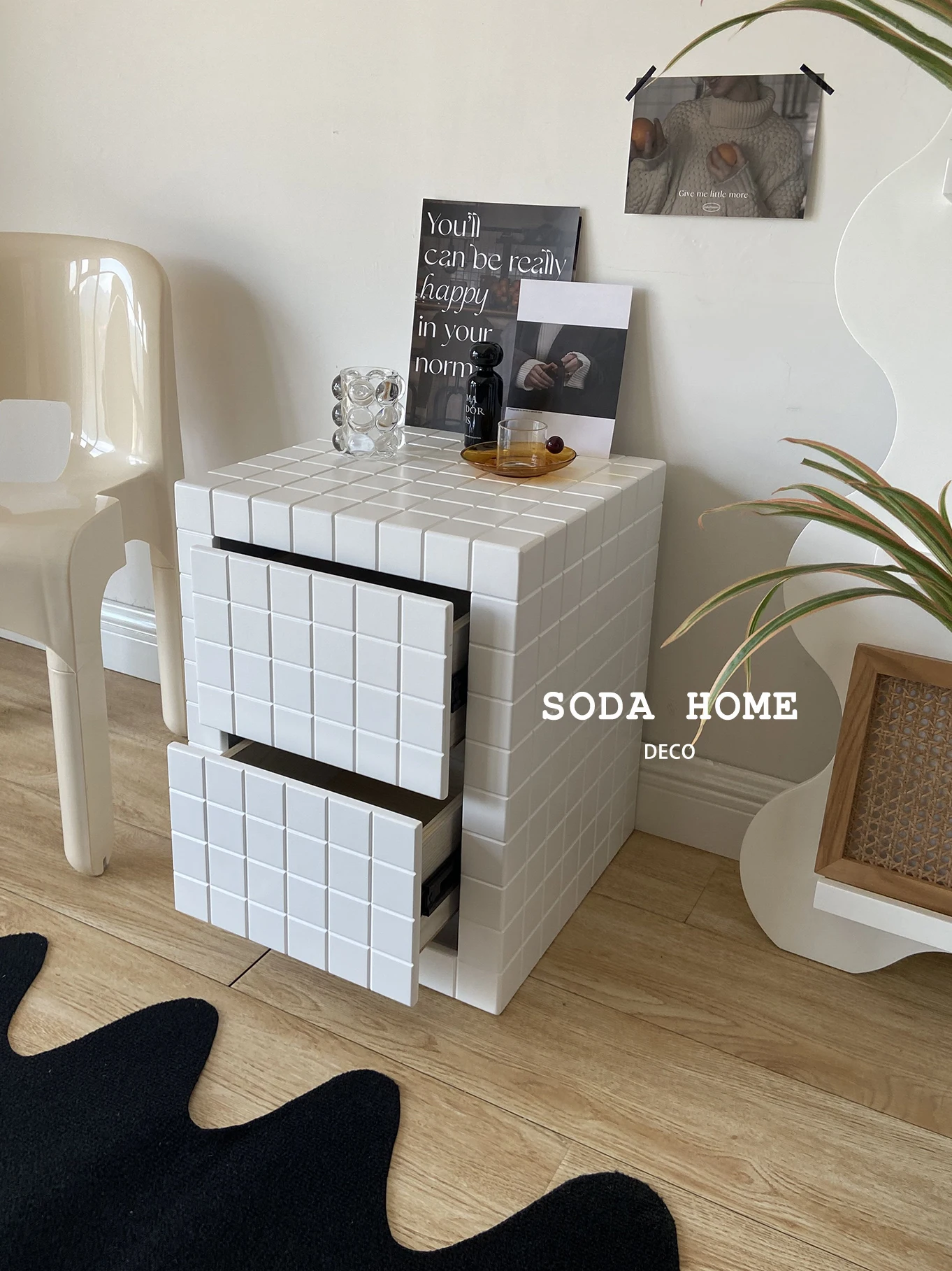 Several small coffee tables on the side of online celebrity checkerboard sofa Living room storage cabinet drawer-type small cupb