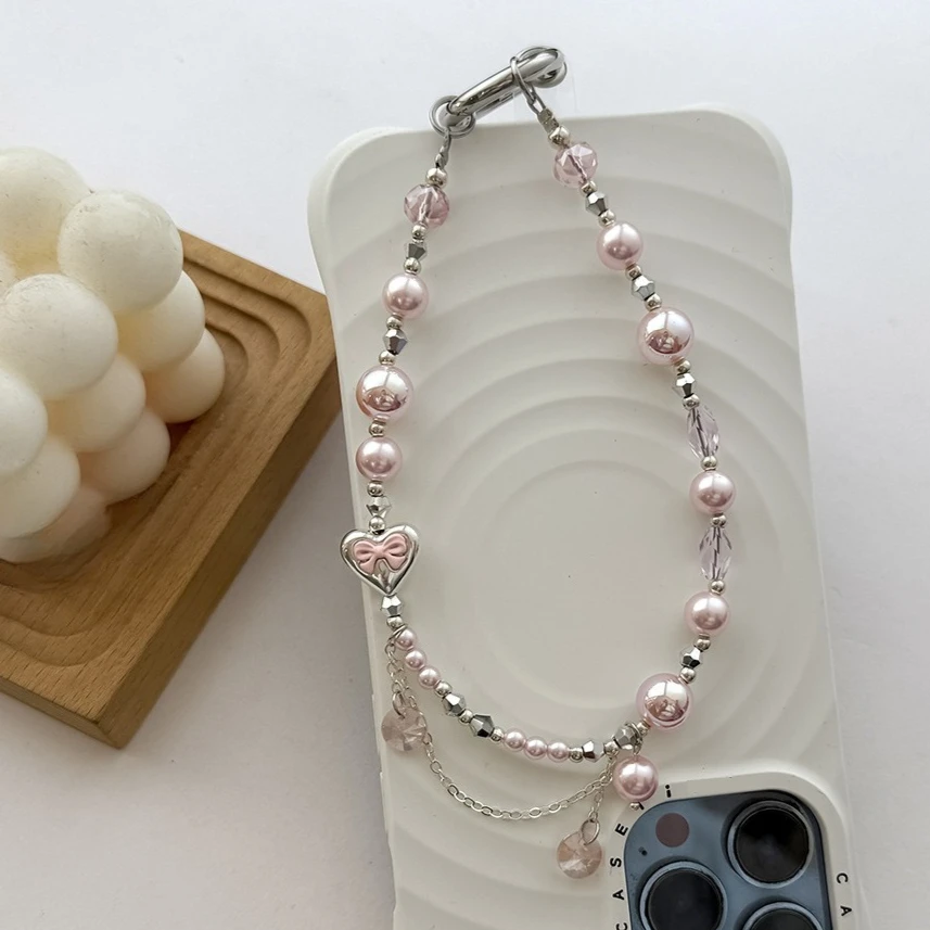 

High-end Bow Love Pearl Mobile Phone Chain Alloy Heart-shaped Bow Accessories Hanging Chain Women's Exquisite Beaded Phone Rope