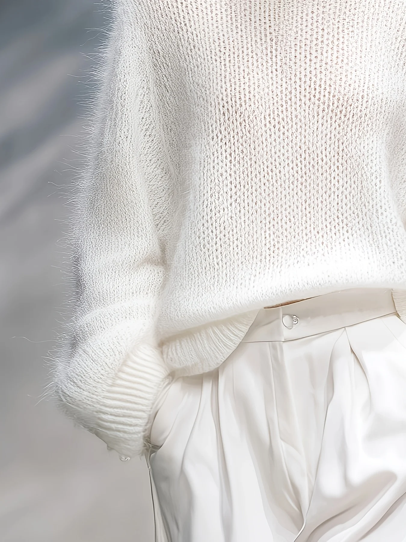 Damen-Strickoberteil in Übergröße, einfarbig, mit Rundhalsausschnitt, locker geschnitten, lässig und elegant, leicht zu kombinieren, ideal für Herbst und Winter. – Detail 5